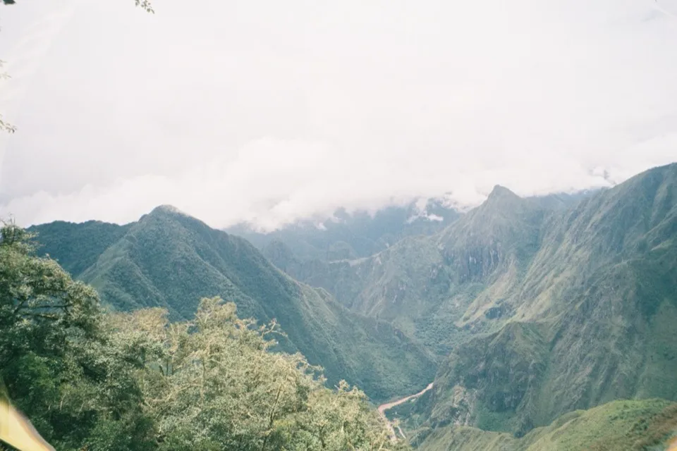 Cloud over the forested mountains of the Urubamba valley